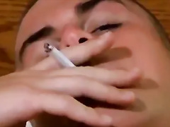 Smoking twink toys his ass and dick solo