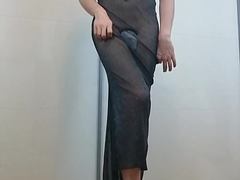 Boy poses barefoot in elegant dress